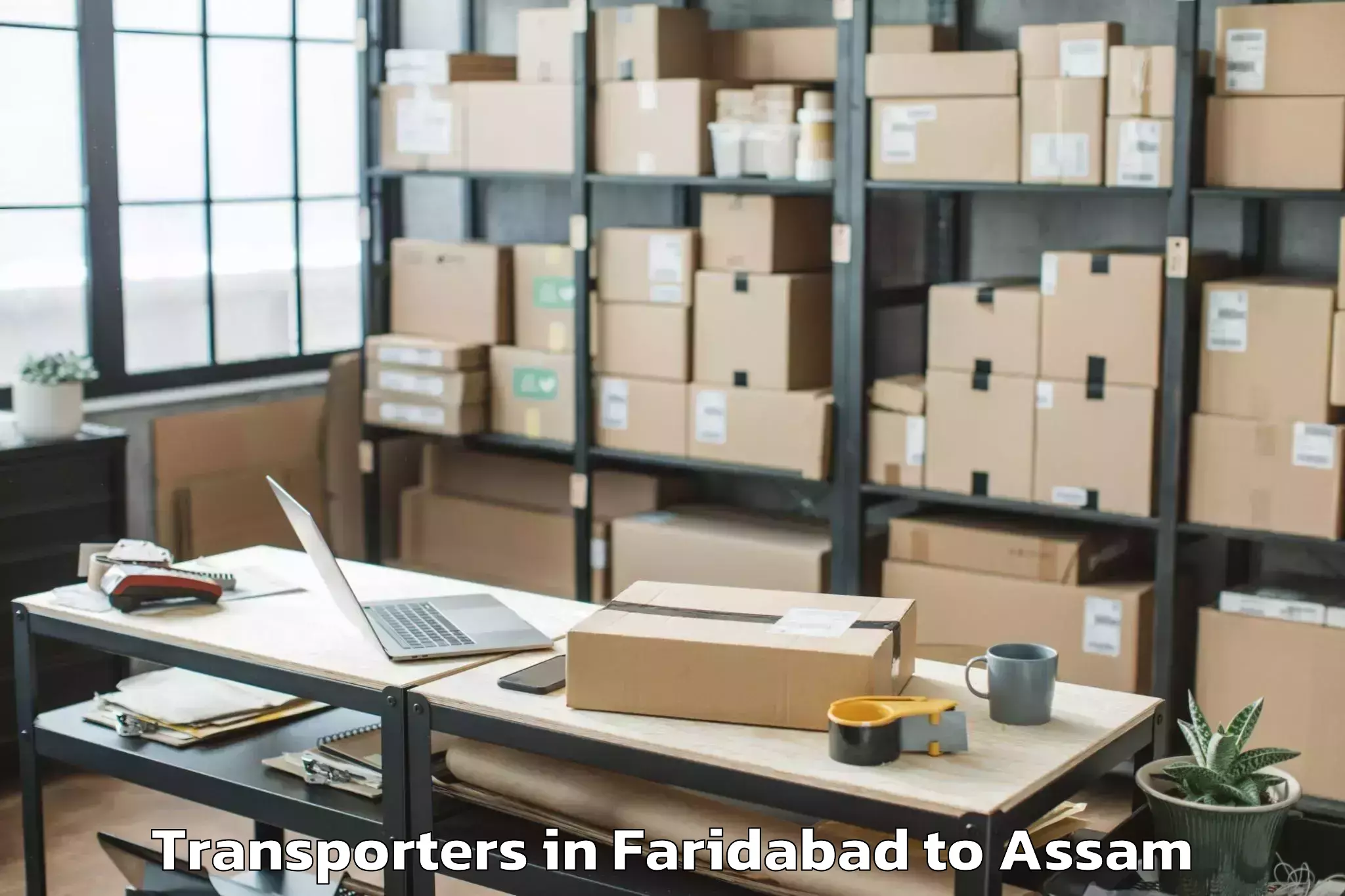 Book Faridabad to Rupsi Airport Rup Transporters Online